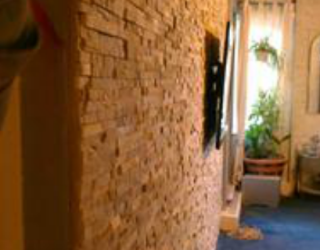 decorative cultured stone wall inside residential home