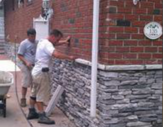 brick wall with stone bottom lining