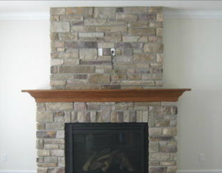 cultured stone fireplace designed and installed